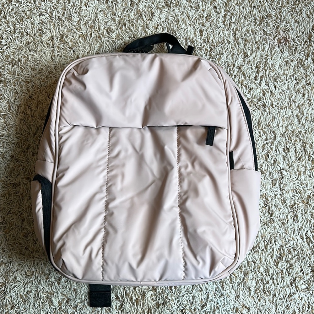 Calpak laptop backpack. Rose quartz color. Barely used.